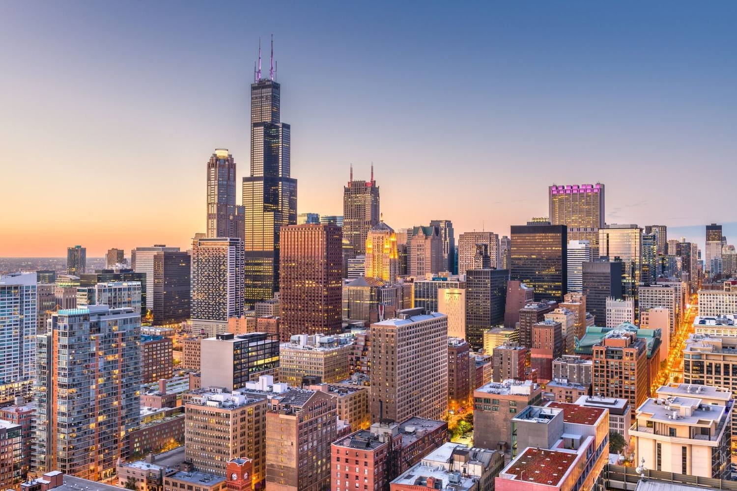 Aerial view of the downtown Chicago skyline at sunset